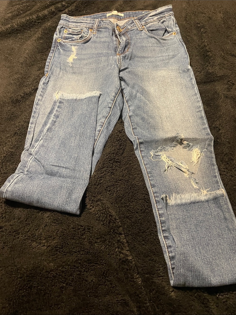 Distressed Women's Blue Denim Jeans